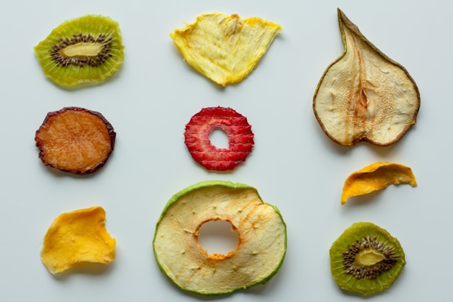 A colorful assortment of dried fruit, providing a sweet vegan snack option.