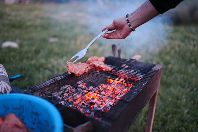 Grilling chicken on a barbecue