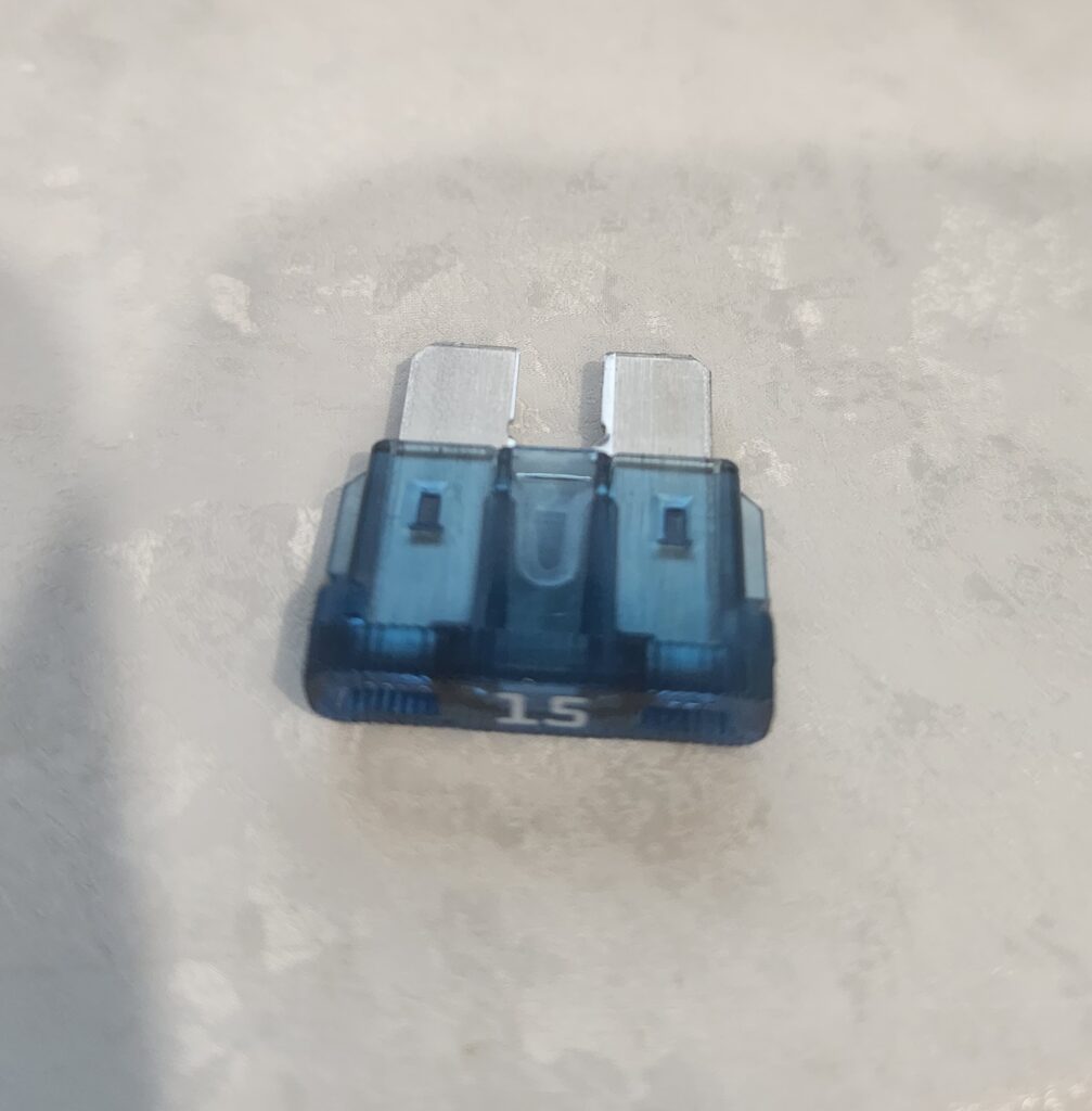 a blue, 15 amp rv refrigerator fuse