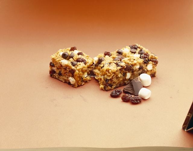 Two protein bars sitting on a table