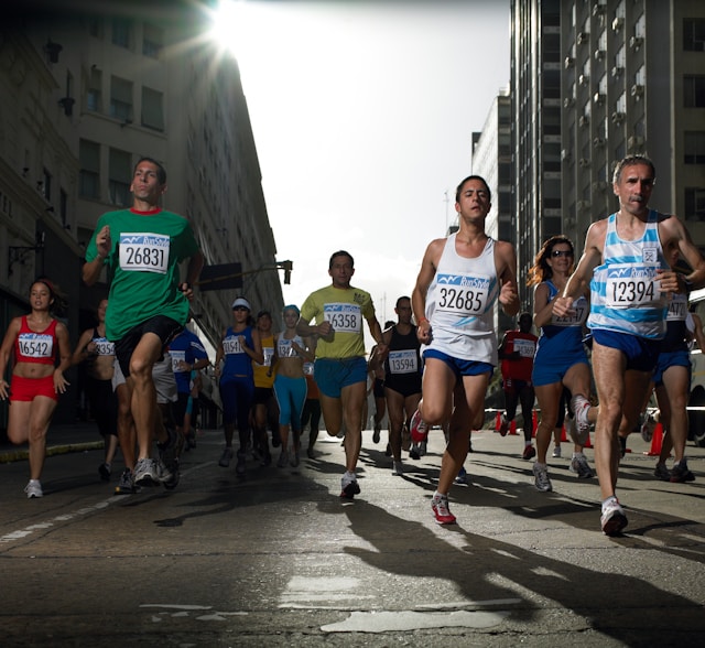 Runners competing in a marathon in an urban setting, capturing the intensity and excitement of the race.